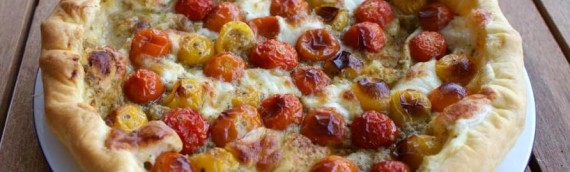 Cherry tomato, mozzarella and olive tart
